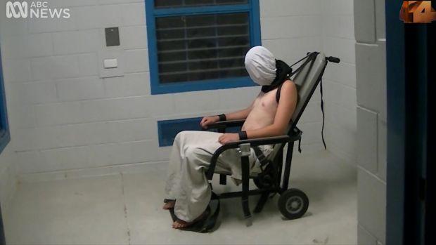A still from the Australian Broadcasting Company’s program Four Corners, showing 17-year-old Dylan Voller strapped into a mechanical restraint chair in March 2015, Northern Territory, Australia. © 2016 Australian Broadcasting Company