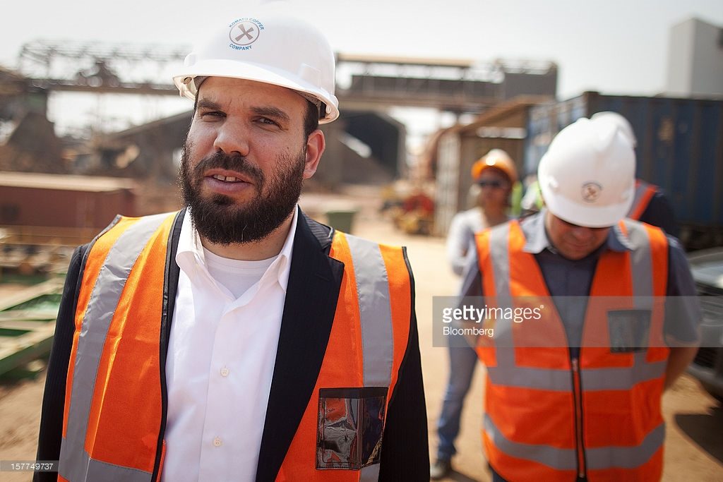 Israeli billionaire Dan Gertler, left, takes a tour of the Katanga Mining Ltd. copper and cobalt mine complex with Shimon Cohen, right, his communications advisor, right, in Kolwezi, Democratic Republic of Congo, on Wednesday, Aug. 1, 2012. Since he first arrived in wartime Congo in 1997 at only 23 years old, Gertler has amassed an empire worth almost $2.5 billion dollars, according to Bloomberg calculations using publicly available documents. Photographer: Simon Dawson/Bloomberg via Getty Images