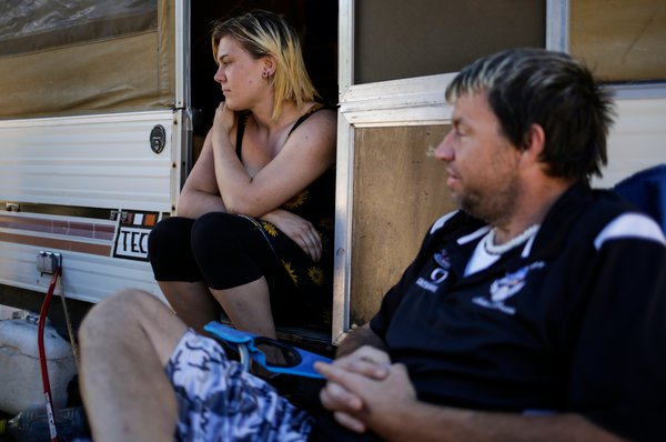 Darcee and Gerald Babbitt at their campsite outside Nederland. “Yes, we’re homeless,” Mr. Babbitt said. “No, we’re not vagrants. No, we’re not beggars.” Nick Cote for The New York Times