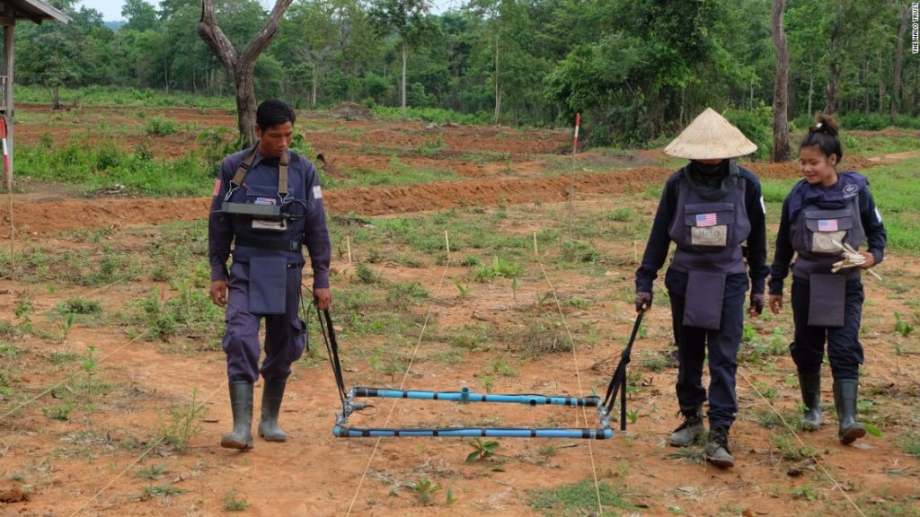 Clearing unexploded bombs in Laos. A HALO Technician uses a detector during the clearance of a Confirmed Hazardous Area (CHA).