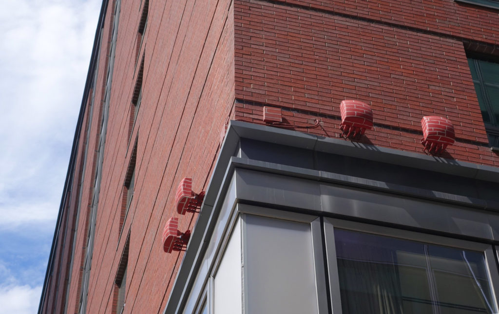 Cell towers blend in above a restaurant in lower Manhattan. Photo: Cora Currier for The Intercept