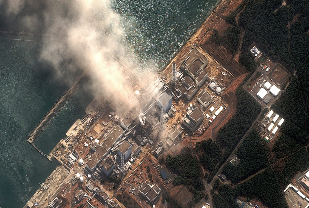 A satellite image shows damage at Fukushima I Nuclear Power Plant in Fukushima Prefecture. The damage was caused by the offshore earthquake that occurred on March 11, 2011. Image credit: Digital Global, courtesy of Greenpeace.